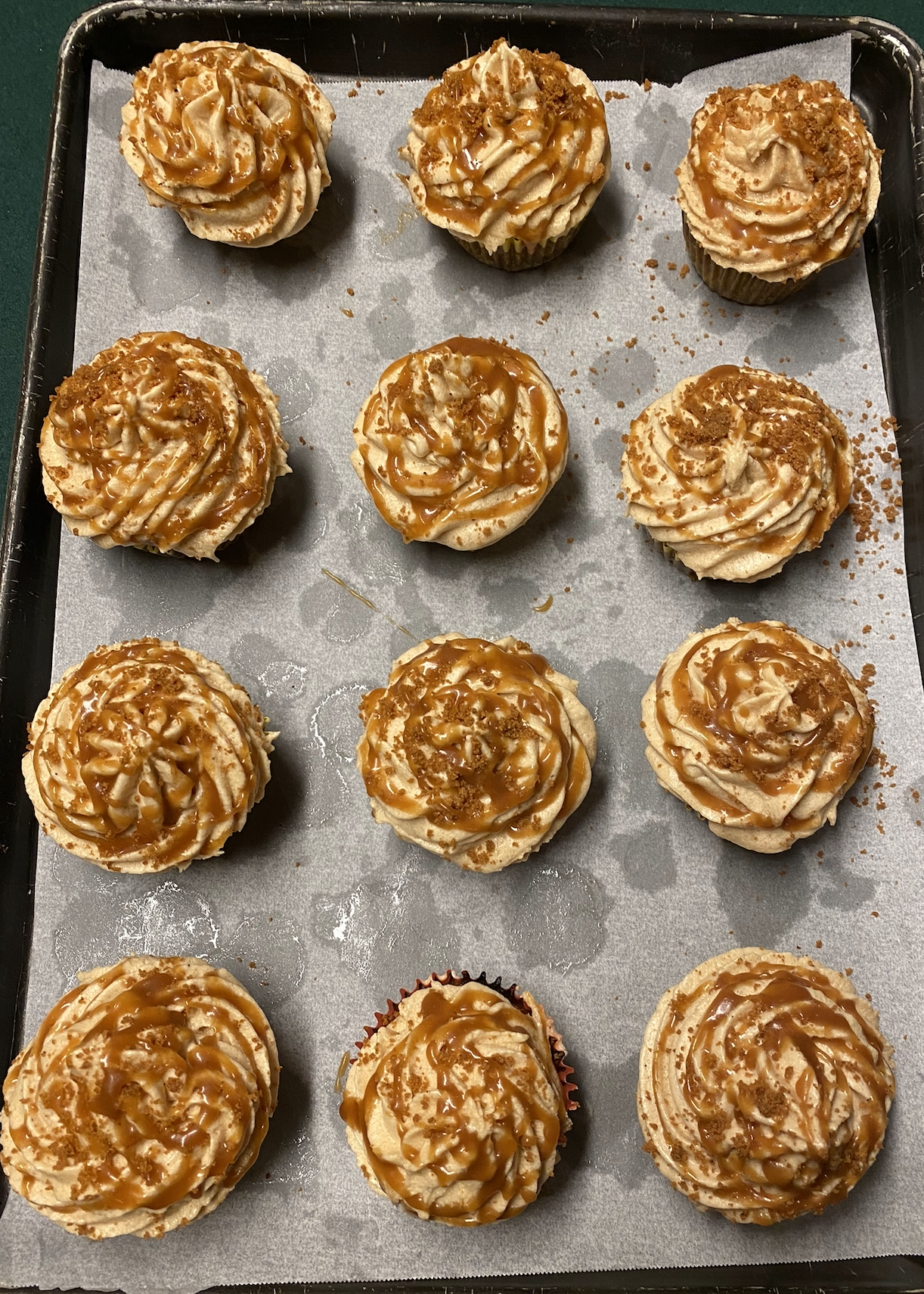 Multiple cupcakes with caramel frosting